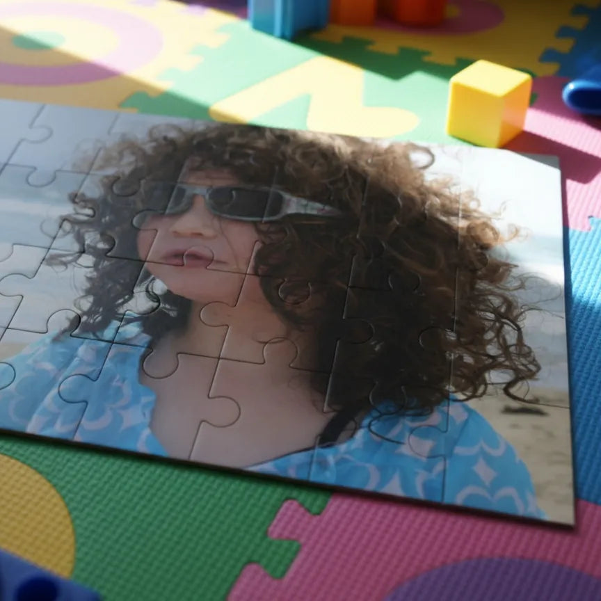 Custom printed 28-piece jigsaw puzzle with a picture of a child.