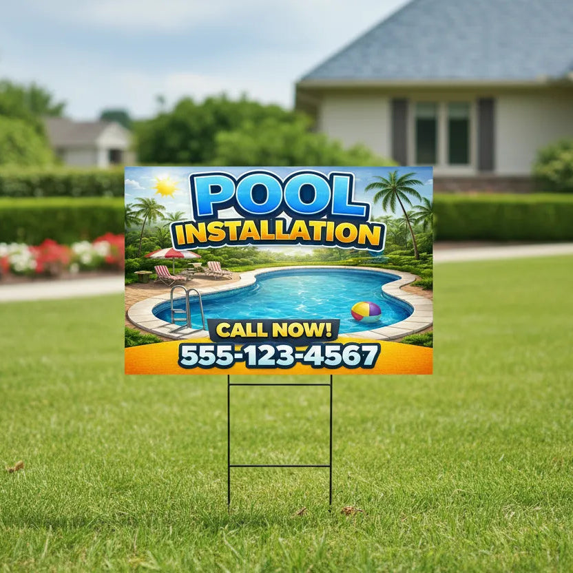 Pool installation sign on a lawn with a house in the background