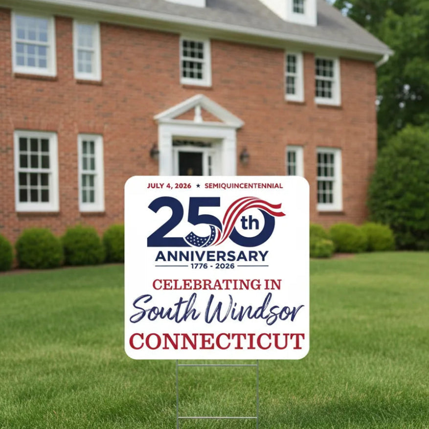 Garden sign celebrating the 250th anniversary of the United States on July 4th, 2026, in South Windsor, Connecticut, in front of a brick house.