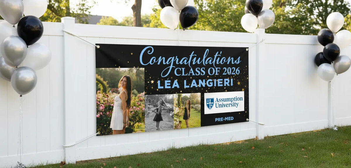 A personalized Class of 2026 graduation photo banner featuring three photos, college branding, and student major, shown as outdoor party décor on a fence with balloons.