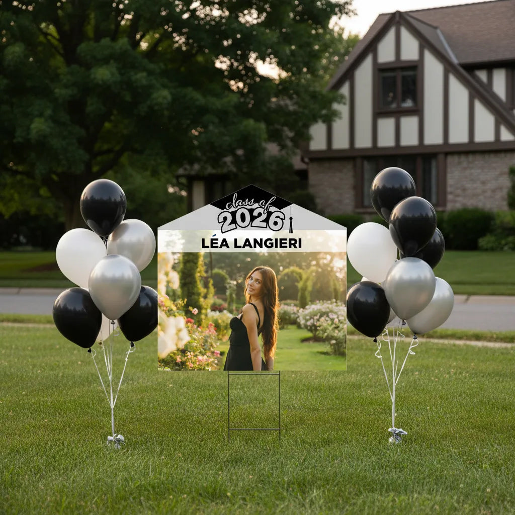 Custom Class of 2026 photo graduation lawn sign for Lea Langieri, displayed outdoors on a grass lawn.